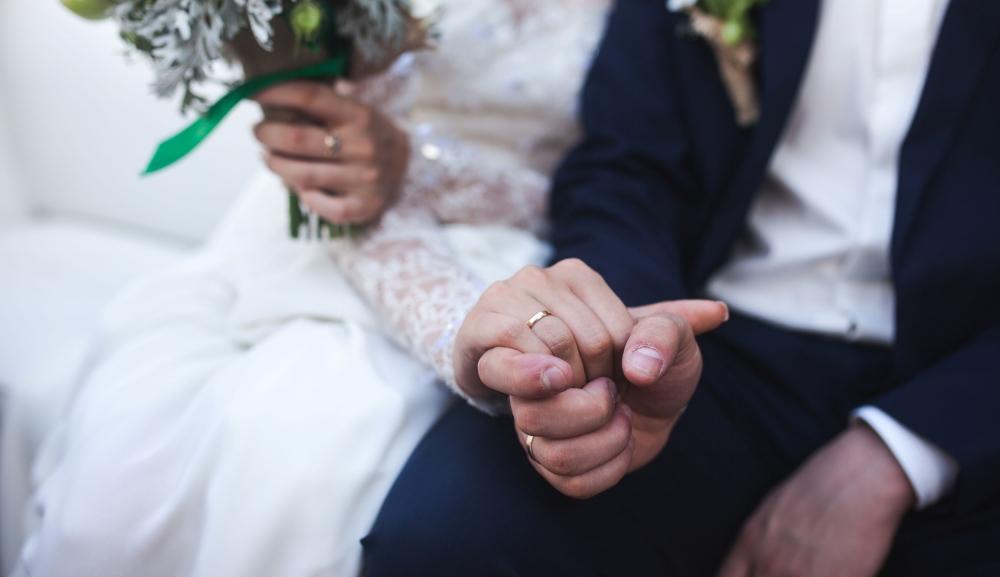crop-hands-bride-groom.jpg