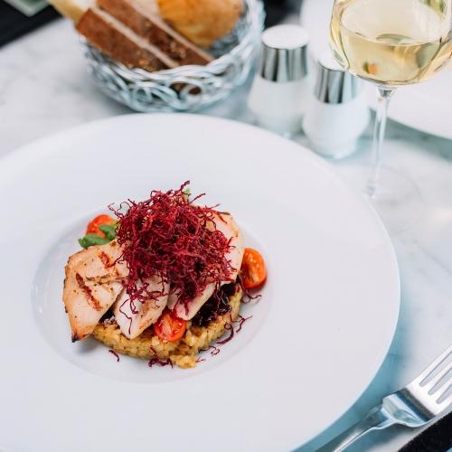 top-view-grilled-chicken-fillet-served-with-bulgur-vegetables-white-wine.jpg
