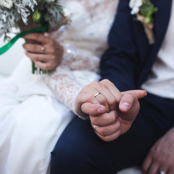 crop-hands-bride-groom.jpg